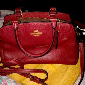 Beautiful maroon coach lilie bag very well taken care of Price is negotiable